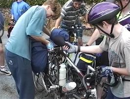Fergus tries to separate his bike from Ben's bike at Glan-y-Mawddach, Barmouth, 34.9 miles into the ride